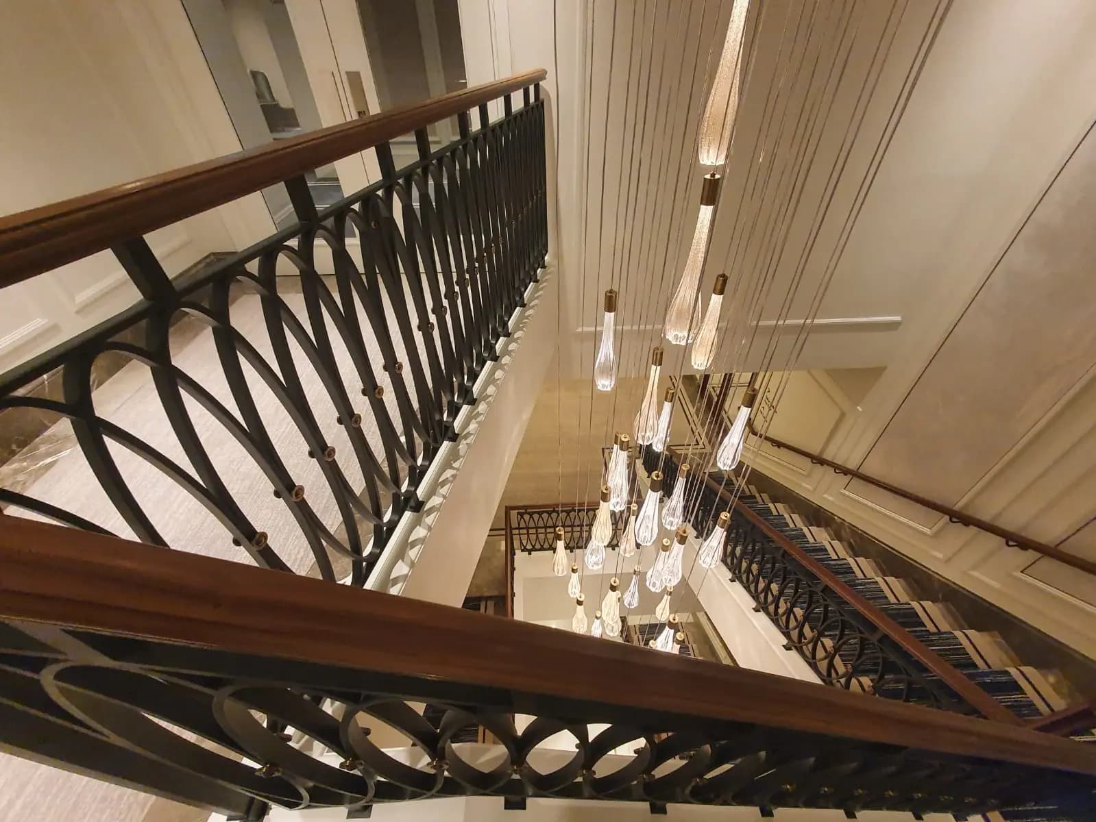 Dark bronze staircase balustrade in a luxury interior