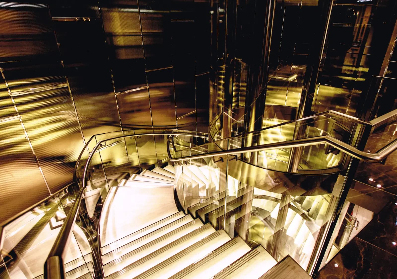 Sculptural staircase at Watches of Switzerland