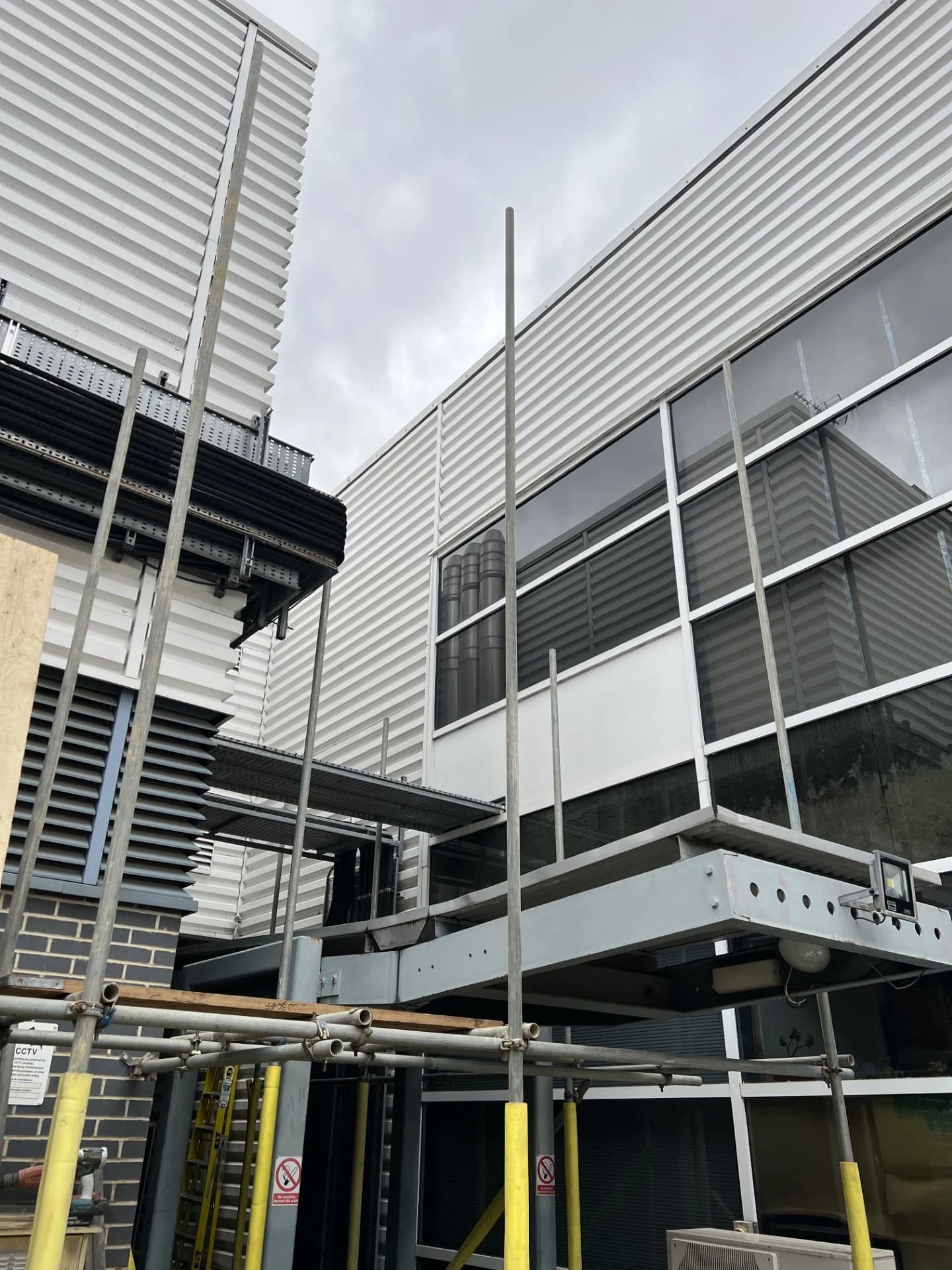 Façade remediation work being carried out at height