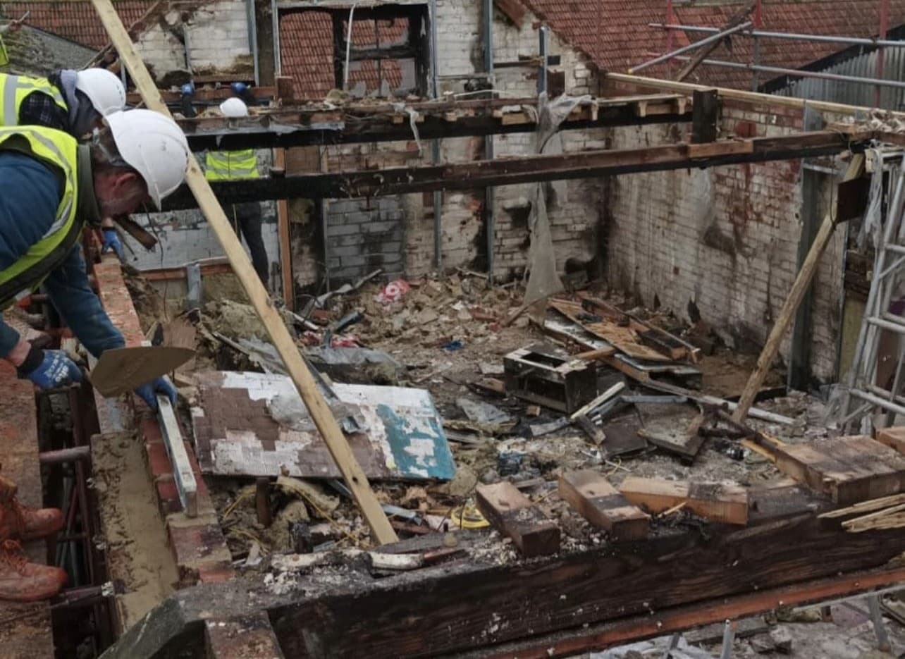 Structural reinstatement work inside the fire-damaged building